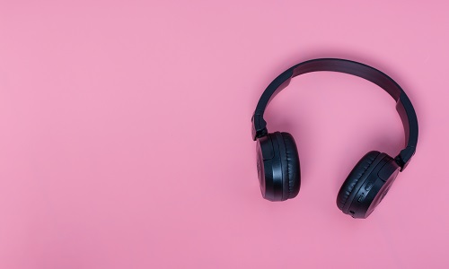 headphones on pink background